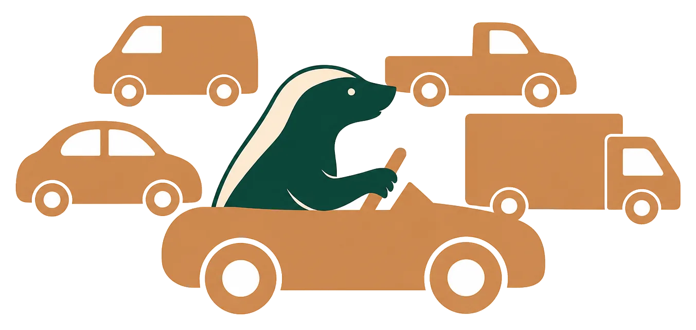 De honingdas van Bouvy Advies rijdt voorop in een wagenpark met een bestelbus, een pick-up, een personenauto en een bakwagen eromheen