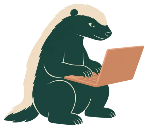 Honingdas zit te typen op een laptop